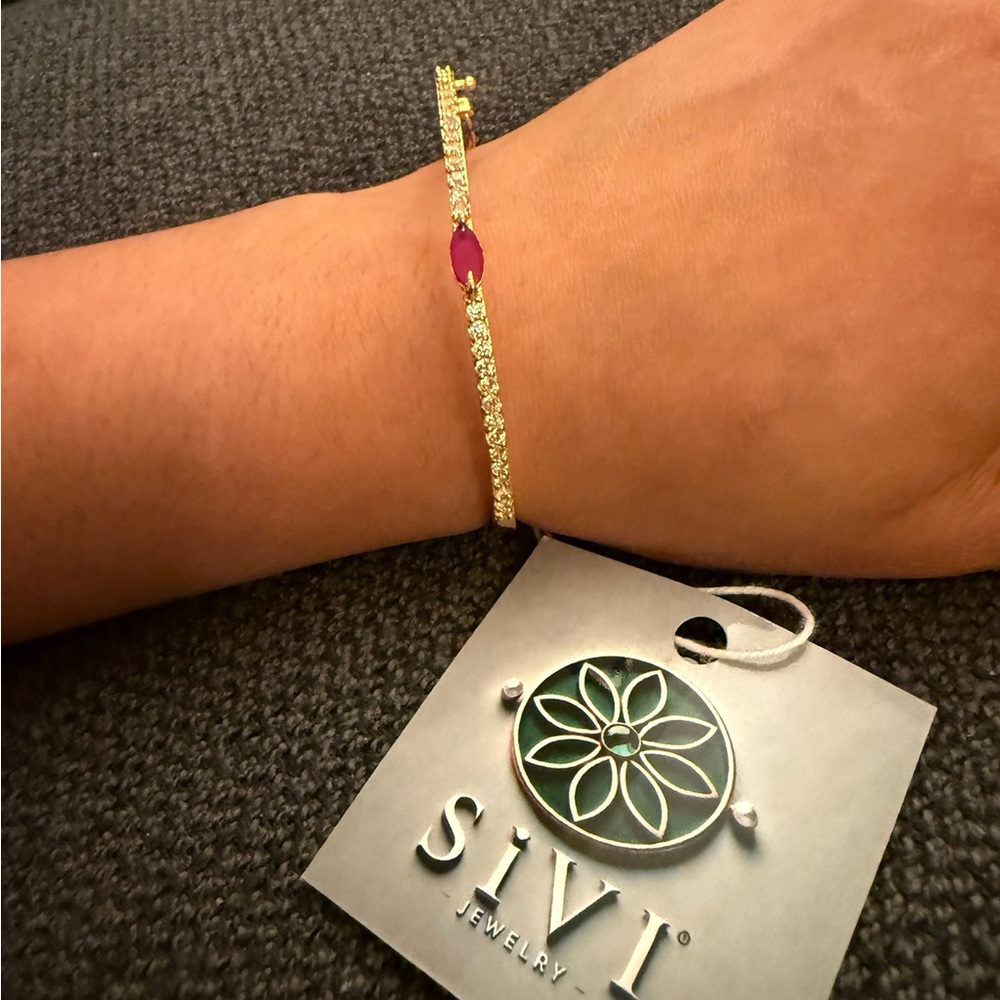 Delicate Gold and Pink Bracelet with a Minimalist Design